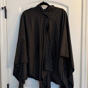 Elegant Black Cape with Polka Dot Lining